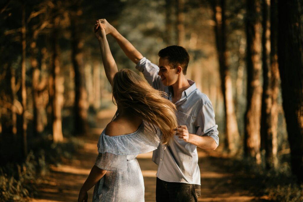 Love Under Surveillance: Is Privacy Killing Romance? 3 man and woman dancing at center of trees