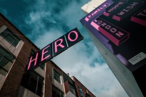 Everyday Heroes: Redefining What It Means to Be a Hero 3 low angle photography of brown concrete building under blue sky during daytime