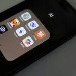 A close up of a cell phone on a table